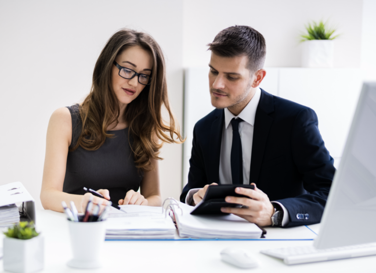 Contadoor accountant and tax attorney putting together a refund file